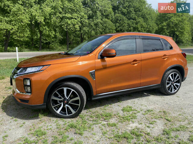 Оранжевый Мицубиси Outlander Sport, объемом двигателя 2.4 л и пробегом 93 тыс. км за 16700 $, фото 3 на Automoto.ua