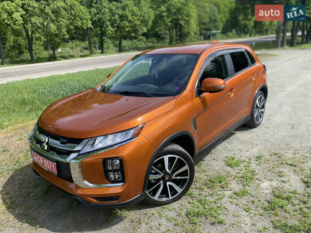 Оранжевый Мицубиси Outlander Sport, объемом двигателя 2.4 л и пробегом 93 тыс. км за 16700 $, фото 4 на Automoto.ua