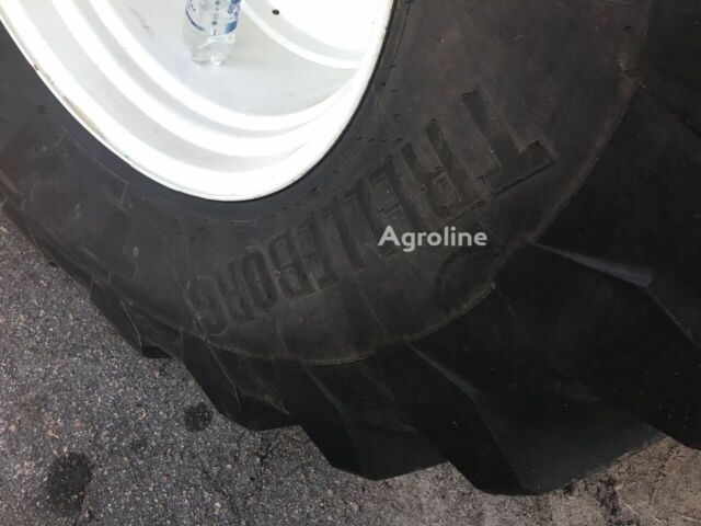 Желтый Нью Холланд ЦР, объемом двигателя 0 л и пробегом 0 тыс. км за 194343 $, фото 9 на Automoto.ua