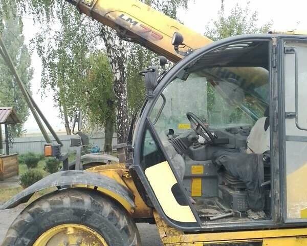Жовтий Нью Холланд ЛБ, об'ємом двигуна 4.5 л та пробігом 7 тис. км за 21000 $, фото 4 на Automoto.ua