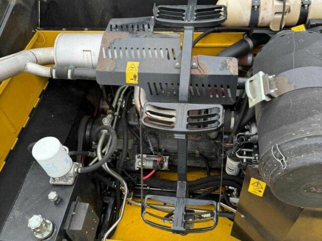 Желтый Нью Холланд TC 5080, объемом двигателя 6.7 л и пробегом 10 тыс. км за 60000 $, фото 11 на Automoto.ua