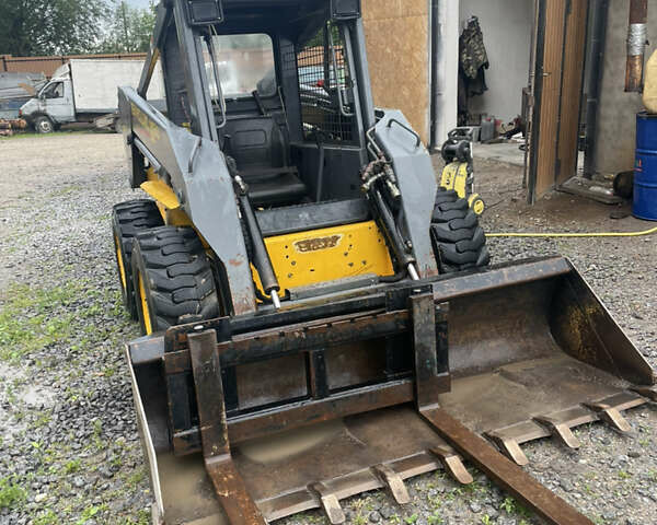 Желтый Нью Холланд LB115 4PS, объемом двигателя 3.2 л и пробегом 1 тыс. км за 17000 $, фото 6 на Automoto.ua