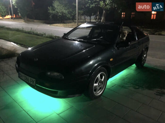 Черный Ниссан 100НХ, объемом двигателя 1.6 л и пробегом 300 тыс. км за 2500 $, фото 14 на Automoto.ua