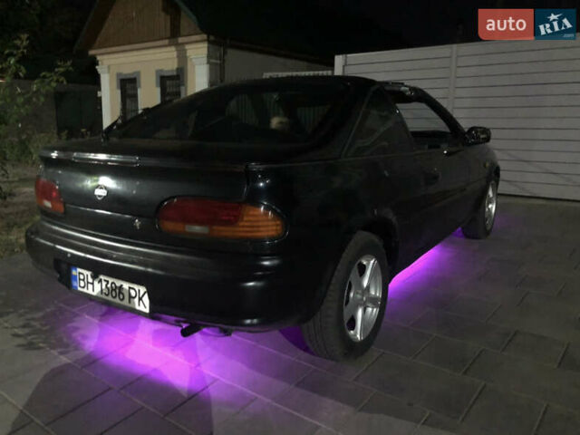 Черный Ниссан 100НХ, объемом двигателя 1.6 л и пробегом 300 тыс. км за 2500 $, фото 12 на Automoto.ua