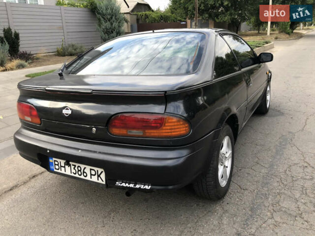 Черный Ниссан 100НХ, объемом двигателя 1.6 л и пробегом 300 тыс. км за 2500 $, фото 16 на Automoto.ua