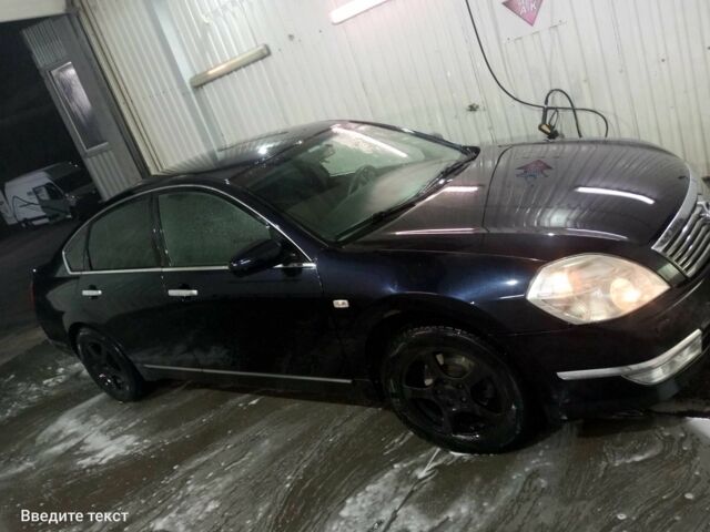 Черный Ниссан 110, объемом двигателя 2 л и пробегом 263 тыс. км за 4900 $, фото 3 на Automoto.ua