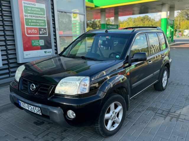 Черный Ниссан 110, объемом двигателя 2 л и пробегом 293 тыс. км за 2500 $, фото 1 на Automoto.ua