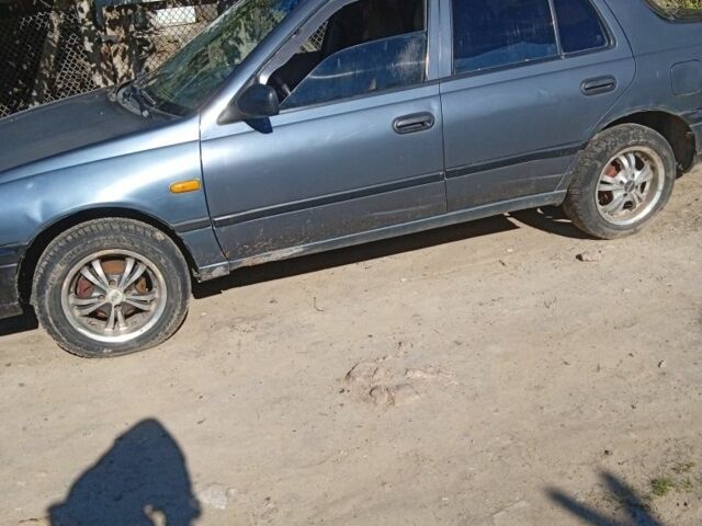 Сірий Ніссан 110, об'ємом двигуна 1 л та пробігом 40 тис. км за 650 $, фото 2 на Automoto.ua