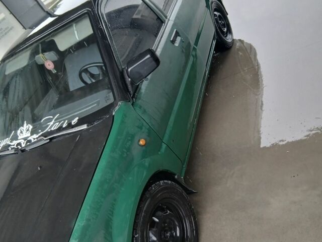 Зелений Ніссан 110, об'ємом двигуна 1.6 л та пробігом 400 тис. км за 600 $, фото 2 на Automoto.ua