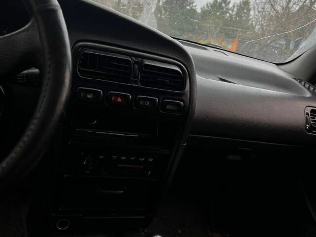 Сірий Ніссан 200 СХ, об'ємом двигуна 2 л та пробігом 300 тис. км за 500 $, фото 5 на Automoto.ua