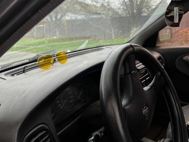 Сірий Ніссан 200 СХ, об'ємом двигуна 2 л та пробігом 300 тис. км за 500 $, фото 4 на Automoto.ua