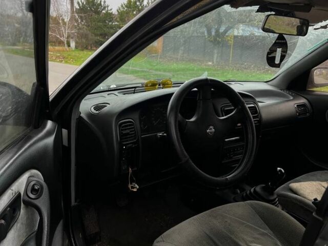 Сірий Ніссан 200 СХ, об'ємом двигуна 2 л та пробігом 300 тис. км за 500 $, фото 3 на Automoto.ua