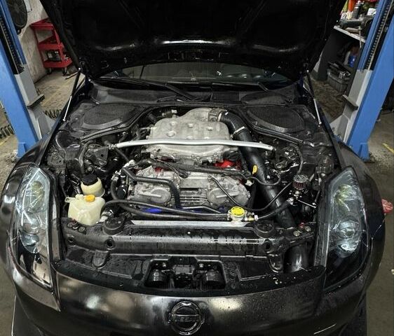 Черный Ниссан 350З, объемом двигателя 3.5 л и пробегом 158 тыс. км за 15000 $, фото 3 на Automoto.ua