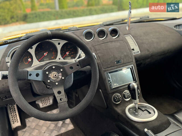 Желтый Ниссан 350З, объемом двигателя 3.5 л и пробегом 115 тыс. км за 12900 $, фото 23 на Automoto.ua