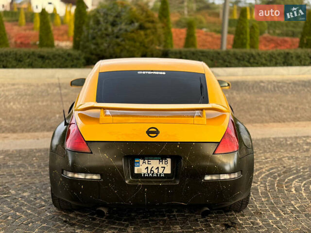 Желтый Ниссан 350З, объемом двигателя 3.5 л и пробегом 115 тыс. км за 12900 $, фото 11 на Automoto.ua