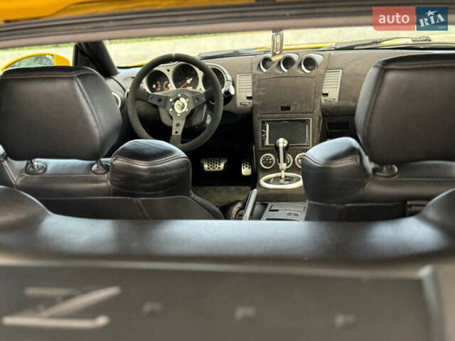 Желтый Ниссан 350З, объемом двигателя 3.5 л и пробегом 115 тыс. км за 12900 $, фото 20 на Automoto.ua