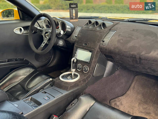 Желтый Ниссан 350З, объемом двигателя 3.5 л и пробегом 115 тыс. км за 12900 $, фото 19 на Automoto.ua