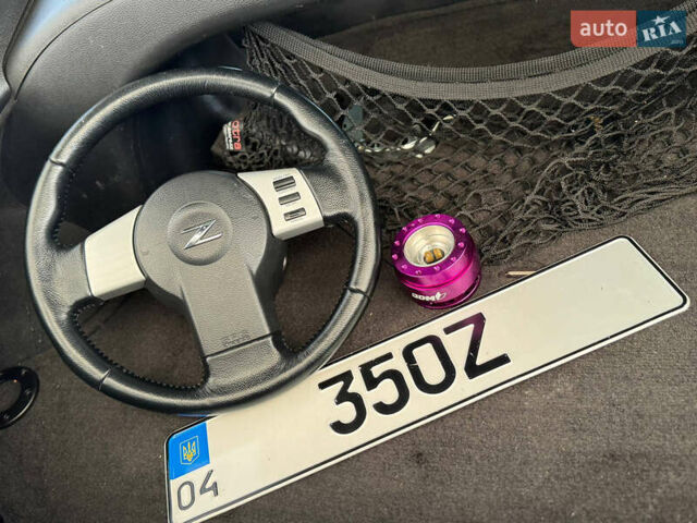 Желтый Ниссан 350З, объемом двигателя 3.5 л и пробегом 115 тыс. км за 12900 $, фото 21 на Automoto.ua