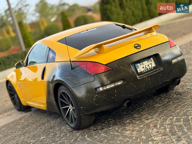 Желтый Ниссан 350З, объемом двигателя 3.5 л и пробегом 115 тыс. км за 12900 $, фото 9 на Automoto.ua