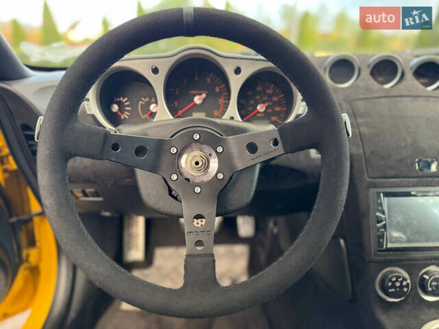 Желтый Ниссан 350З, объемом двигателя 3.5 л и пробегом 115 тыс. км за 12900 $, фото 24 на Automoto.ua