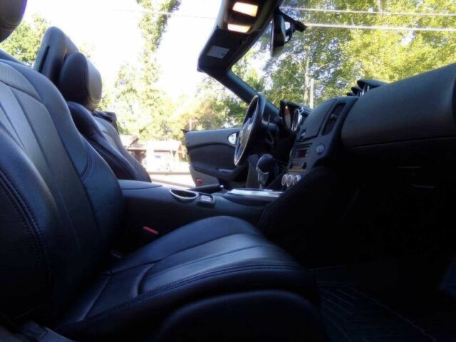 Черный Ниссан 370 З, объемом двигателя 3.7 л и пробегом 35 тыс. км за 12000 $, фото 7 на Automoto.ua