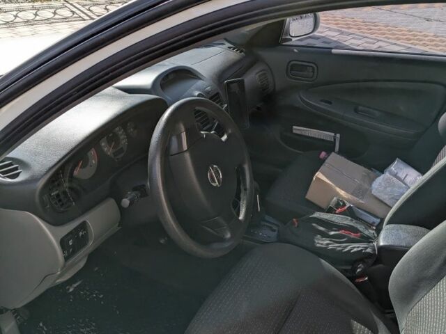 Белый Ниссан Альмера Классик, объемом двигателя 1.6 л и пробегом 220 тыс. км за 3800 $, фото 6 на Automoto.ua