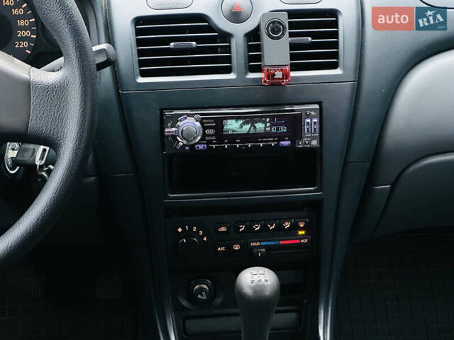 Бежевий Ніссан Альмера Класік, об'ємом двигуна 1.6 л та пробігом 61 тис. км за 6499 $, фото 24 на Automoto.ua