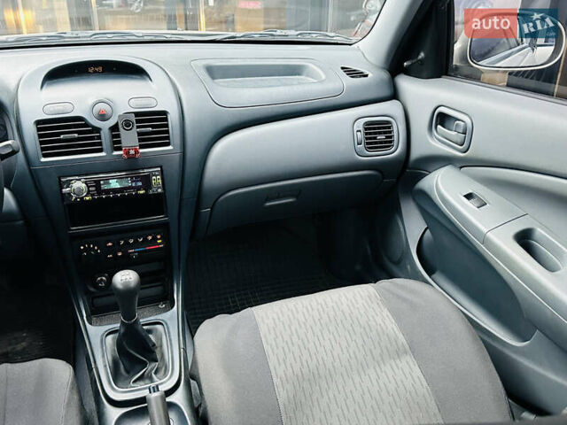 Бежевий Ніссан Альмера Класік, об'ємом двигуна 1.6 л та пробігом 61 тис. км за 6499 $, фото 21 на Automoto.ua