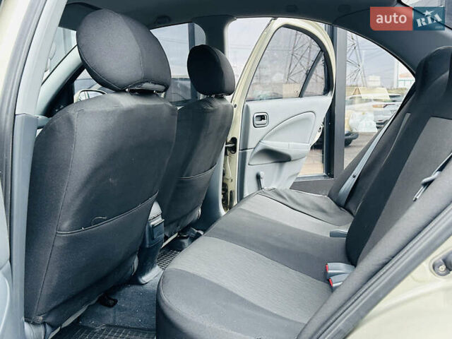 Бежевий Ніссан Альмера Класік, об'ємом двигуна 1.6 л та пробігом 61 тис. км за 6499 $, фото 18 на Automoto.ua