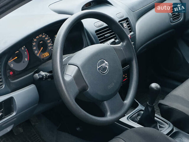 Бежевий Ніссан Альмера Класік, об'ємом двигуна 1.6 л та пробігом 61 тис. км за 6499 $, фото 33 на Automoto.ua