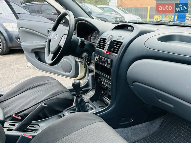 Бежевий Ніссан Альмера Класік, об'ємом двигуна 1.6 л та пробігом 61 тис. км за 6499 $, фото 28 на Automoto.ua