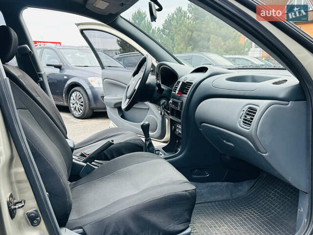 Бежевий Ніссан Альмера Класік, об'ємом двигуна 1.6 л та пробігом 61 тис. км за 6499 $, фото 27 на Automoto.ua