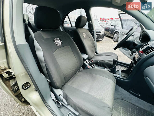 Бежевий Ніссан Альмера Класік, об'ємом двигуна 1.6 л та пробігом 61 тис. км за 6499 $, фото 31 на Automoto.ua