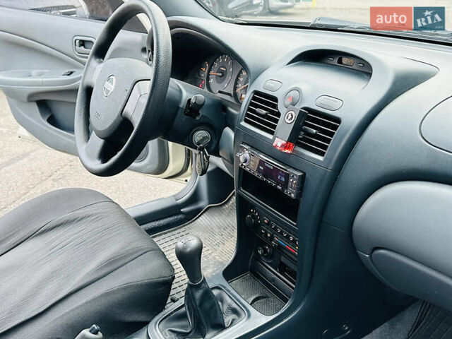 Бежевий Ніссан Альмера Класік, об'ємом двигуна 1.6 л та пробігом 61 тис. км за 6499 $, фото 29 на Automoto.ua