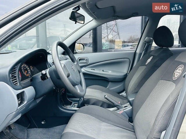 Бежевий Ніссан Альмера Класік, об'ємом двигуна 1.6 л та пробігом 61 тис. км за 6499 $, фото 14 на Automoto.ua