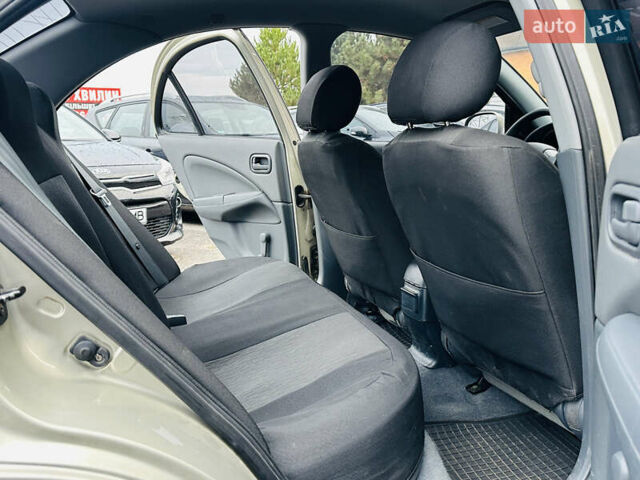 Бежевий Ніссан Альмера Класік, об'ємом двигуна 1.6 л та пробігом 61 тис. км за 6499 $, фото 17 на Automoto.ua