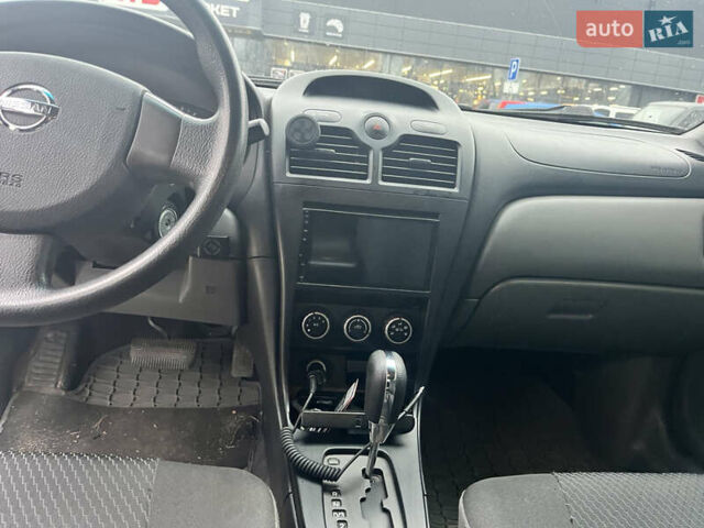 Бежевий Ніссан Альмера Класік, об'ємом двигуна 1.6 л та пробігом 178 тис. км за 5450 $, фото 3 на Automoto.ua