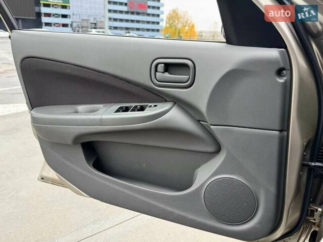 Бежевий Ніссан Альмера Класік, об'ємом двигуна 1.6 л та пробігом 140 тис. км за 6500 $, фото 31 на Automoto.ua