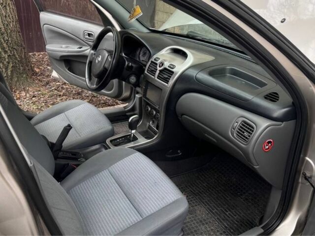 Бежевий Ніссан Альмера Класік, об'ємом двигуна 1.6 л та пробігом 175 тис. км за 5750 $, фото 9 на Automoto.ua