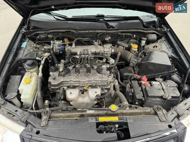 Чорний Ніссан Альмера Класік, об'ємом двигуна 1.6 л та пробігом 245 тис. км за 4600 $, фото 11 на Automoto.ua