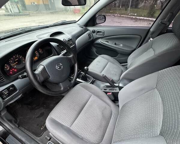 Чорний Ніссан Альмера Класік, об'ємом двигуна 1.6 л та пробігом 245 тис. км за 4600 $, фото 13 на Automoto.ua