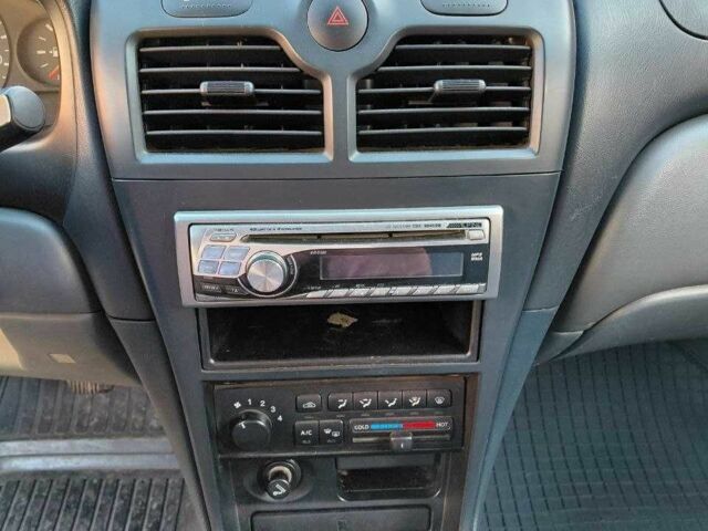 Чорний Ніссан Альмера Класік, об'ємом двигуна 1.6 л та пробігом 210 тис. км за 4600 $, фото 6 на Automoto.ua