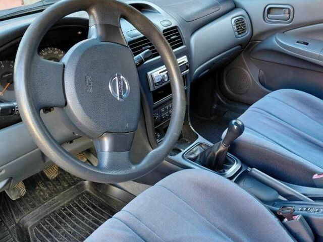 Чорний Ніссан Альмера Класік, об'ємом двигуна 1.6 л та пробігом 210 тис. км за 4600 $, фото 7 на Automoto.ua