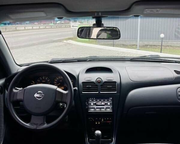 Чорний Ніссан Альмера Класік, об'ємом двигуна 1.6 л та пробігом 245 тис. км за 4600 $, фото 18 на Automoto.ua