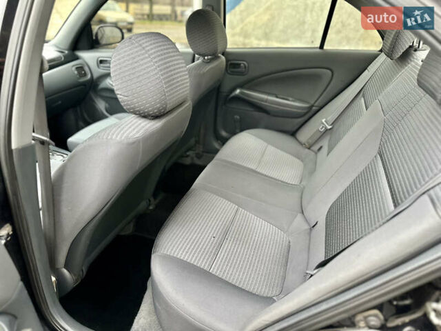 Черный Ниссан Альмера Классик, объемом двигателя 1.6 л и пробегом 183 тыс. км за 4400 $, фото 10 на Automoto.ua