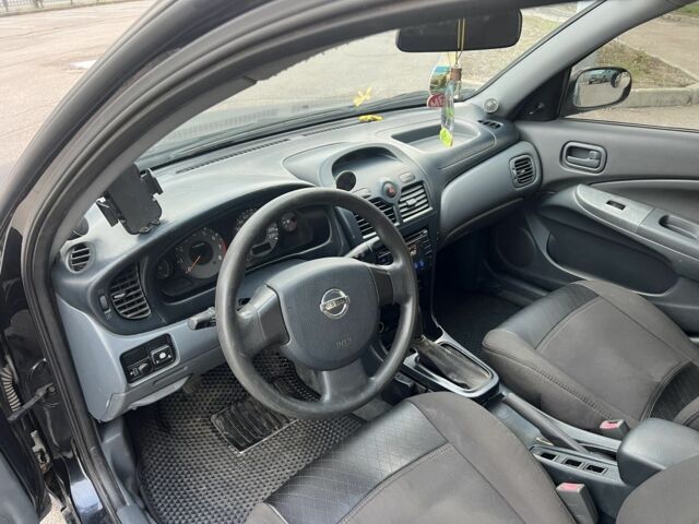 Чорний Ніссан Альмера Класік, об'ємом двигуна 1.6 л та пробігом 220 тис. км за 3400 $, фото 17 на Automoto.ua