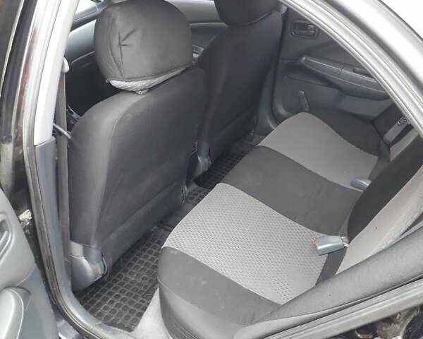 Чорний Ніссан Альмера Класік, об'ємом двигуна 1.6 л та пробігом 280 тис. км за 3999 $, фото 7 на Automoto.ua