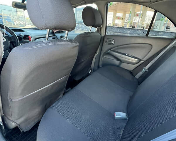 Черный Ниссан Альмера Классик, объемом двигателя 1.6 л и пробегом 250 тыс. км за 4800 $, фото 21 на Automoto.ua