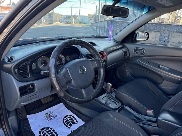 Черный Ниссан Альмера Классик, объемом двигателя 1.6 л и пробегом 250 тыс. км за 4800 $, фото 15 на Automoto.ua