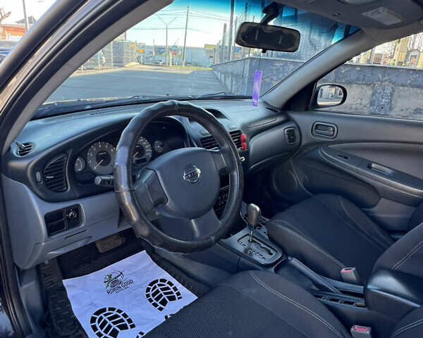 Черный Ниссан Альмера Классик, объемом двигателя 1.6 л и пробегом 250 тыс. км за 4800 $, фото 15 на Automoto.ua